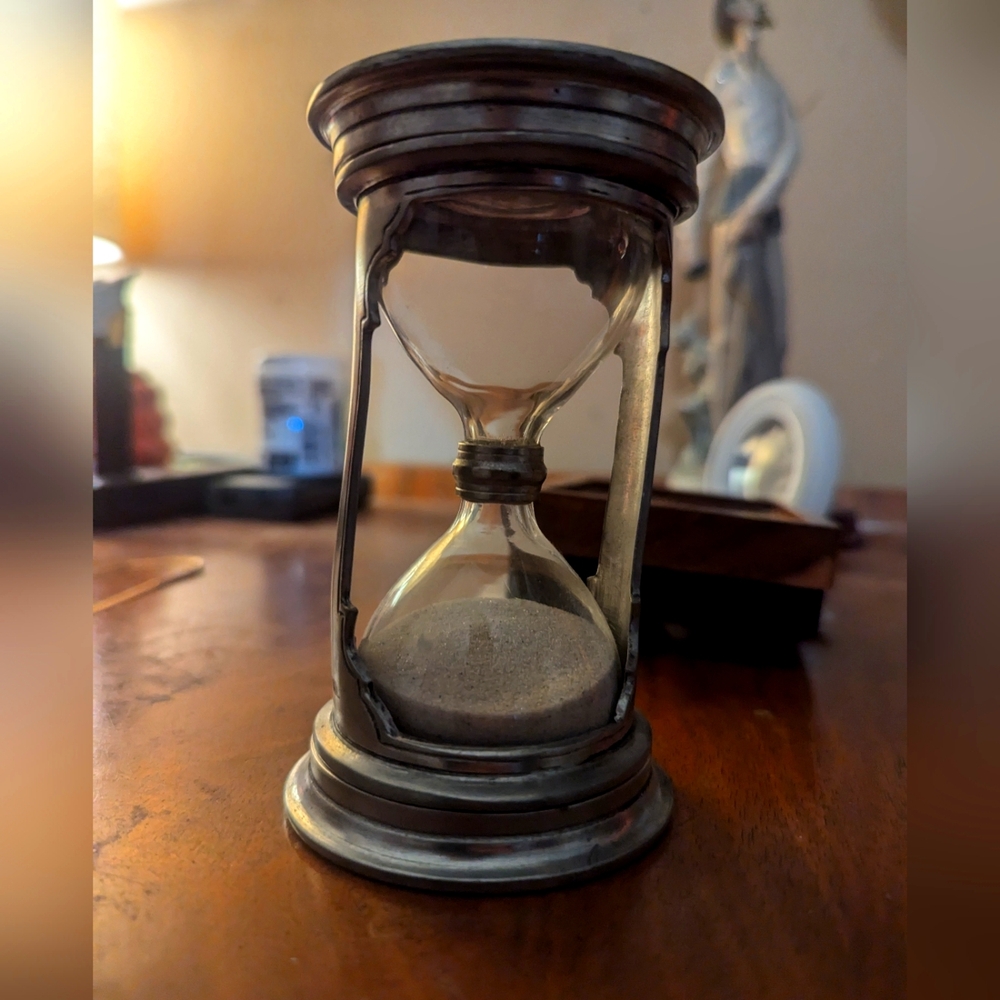 Antique Silver Hour Glass. Super unique and a great antique accent piece.